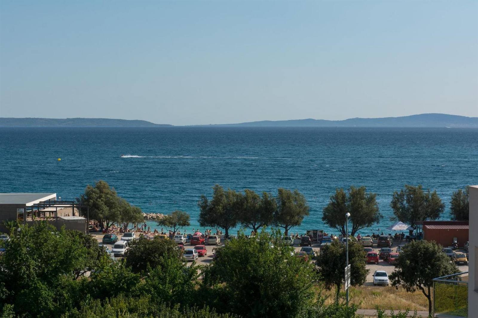 Sea view with the islands on the horizon and the beach area below